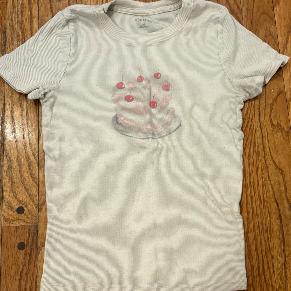 Hollister White Tee with Pink Cake Design
